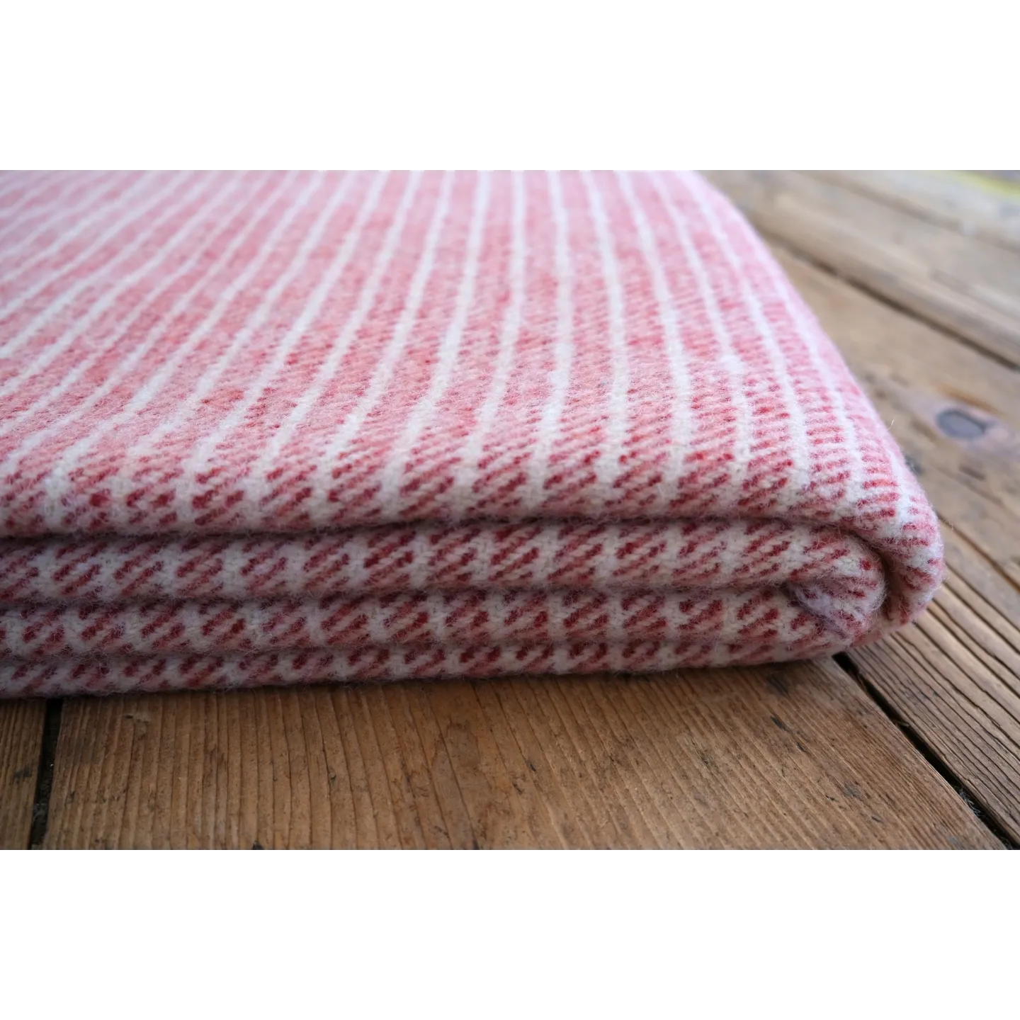 Large red striped woolen blanket made of natural wool